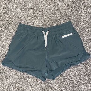 green vuori shorts